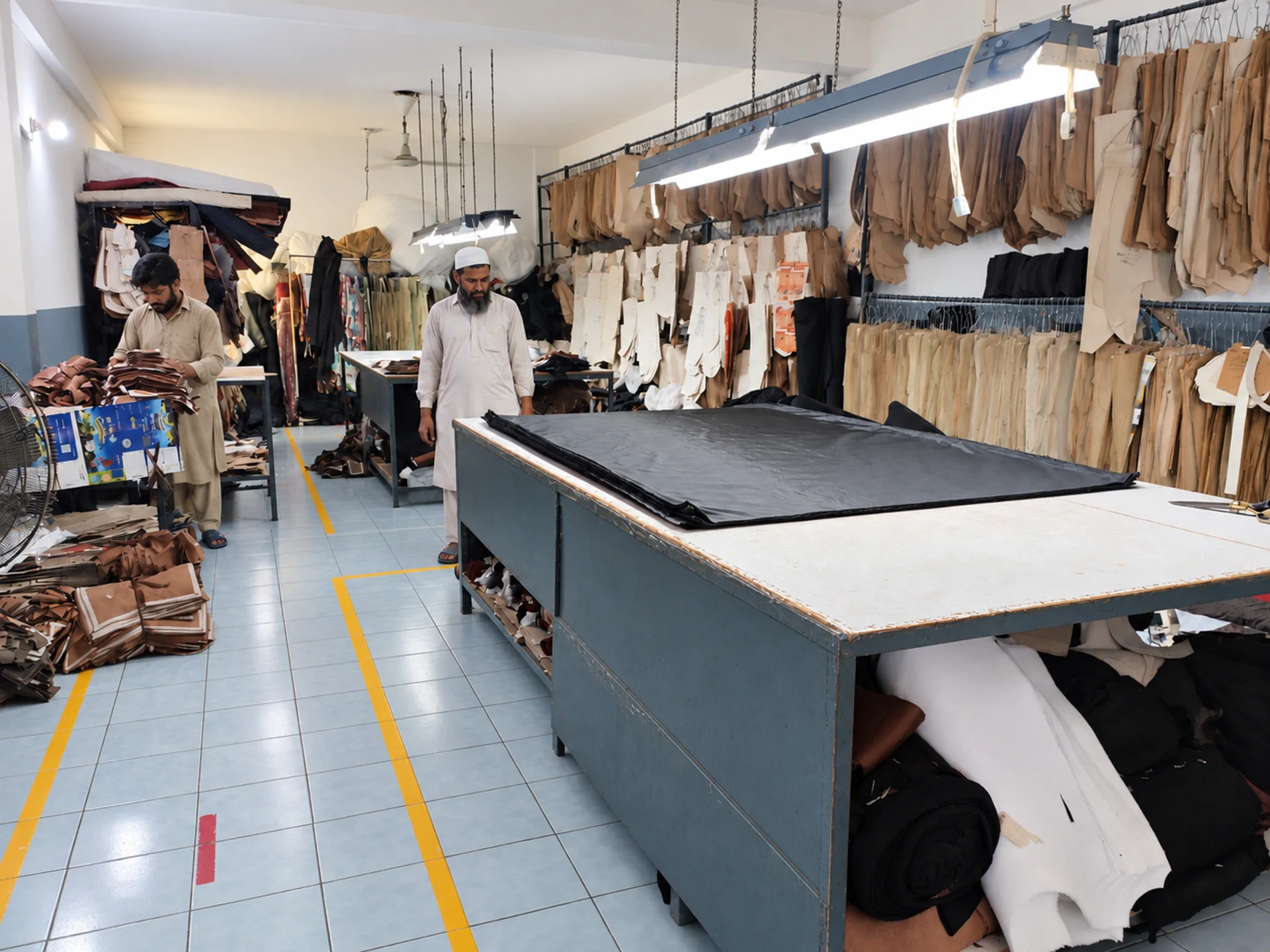 In-house leather pattern room with trained Pakistani workers